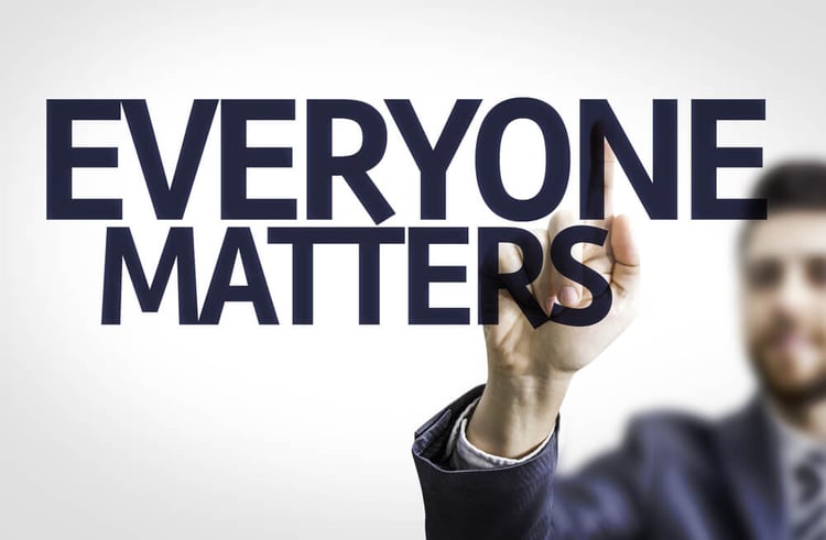 Business man pointing to transparent board with text Everyone Matters-1_seo-opt